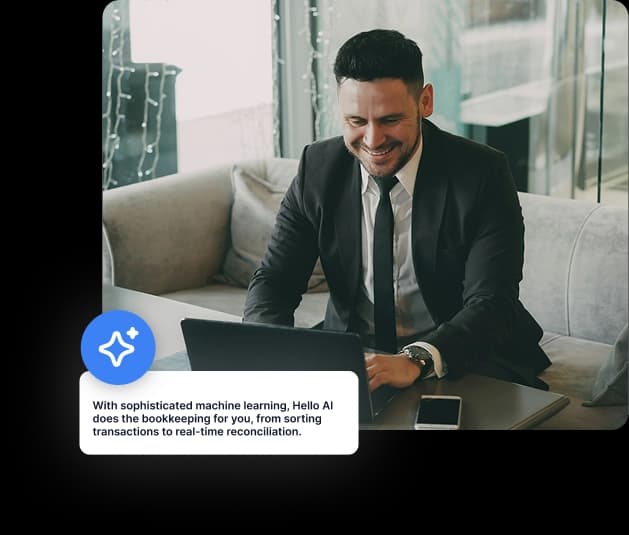 Man in suit at computer