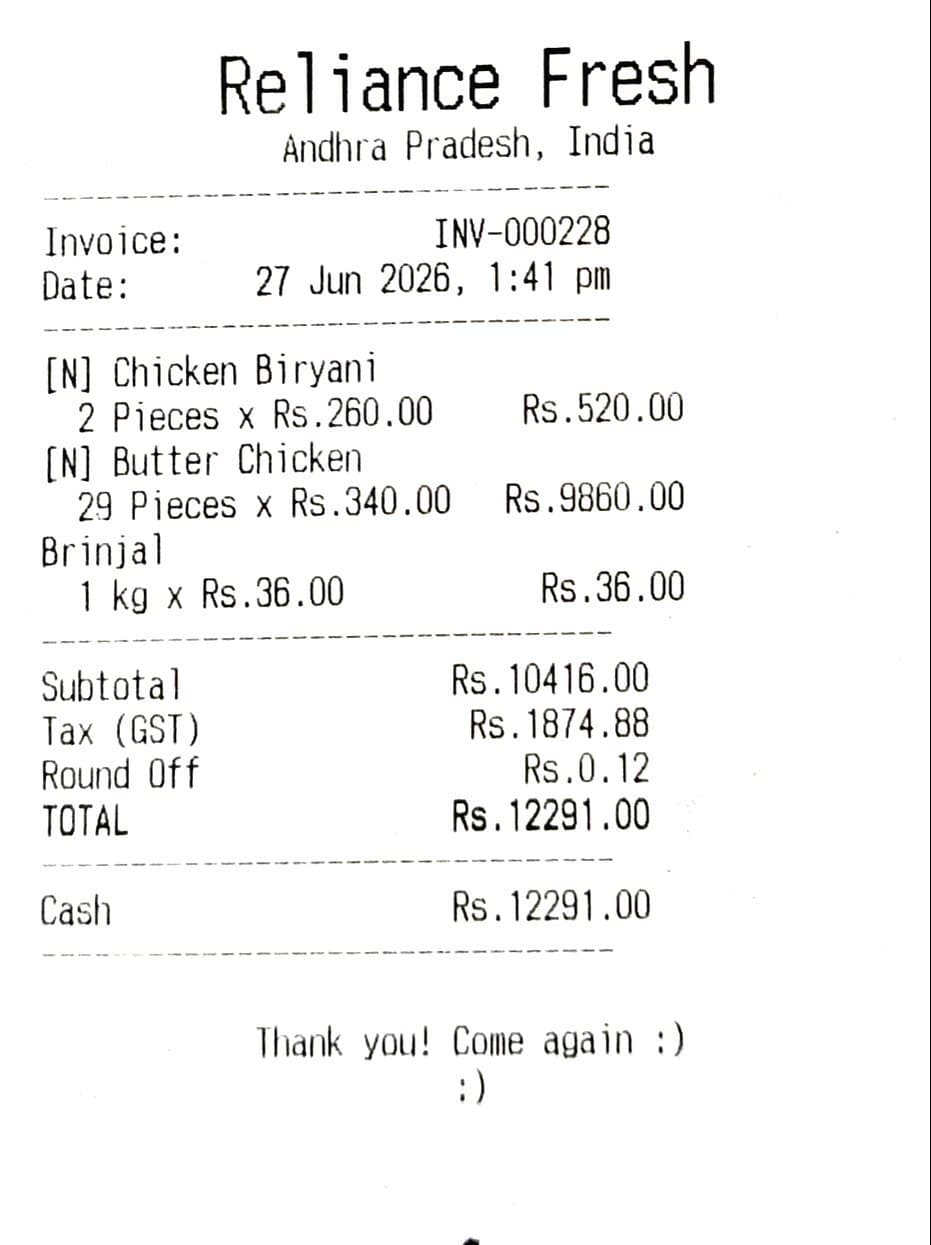 Retail POS invoice from Reliance Fresh showing multiple items with per-unit pricing and GST